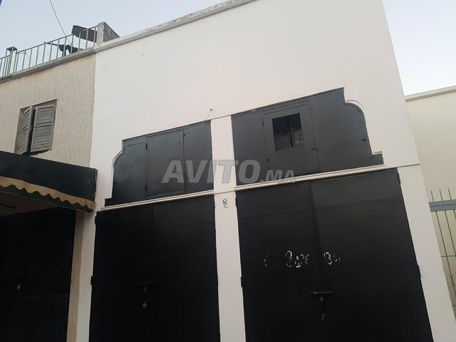 Magasin avec 2 façades opposées