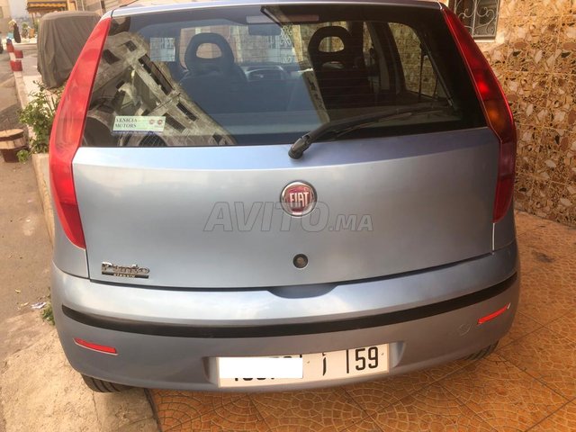 Voiture Fiat Punto 2012 à Temara Essence - 7 chevaux
