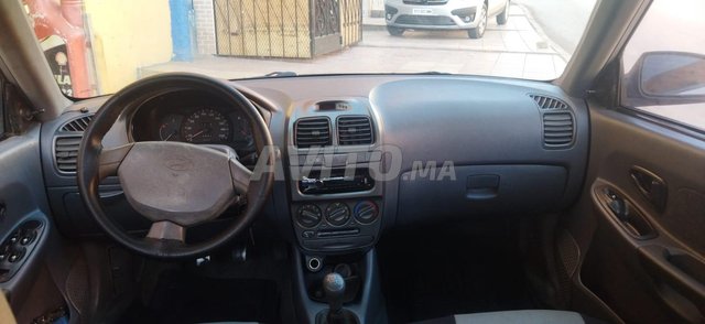 Voiture Hyundai Accent 2004 à Guelmim Essence - 7 chevaux