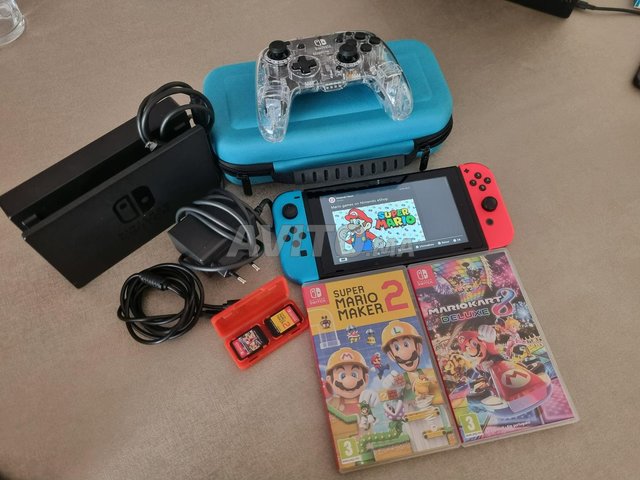 Console Nintendo Switch avec jeux - 1