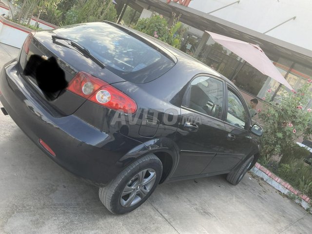 Voiture Chevrolet Optra 2006 à Fès Essence - 8 chevaux