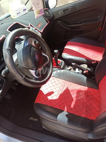 Voiture Ford Fiesta 2014 à Laâyoune Essence - 7 chevaux