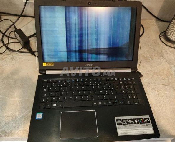 PC Portable ASUS - 1