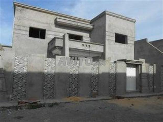 Travaux de construction des maisons et villas