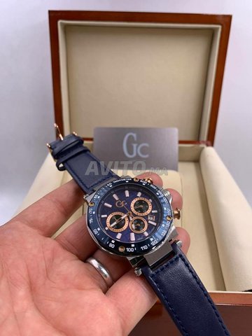 Montre guess homme bleu et online or