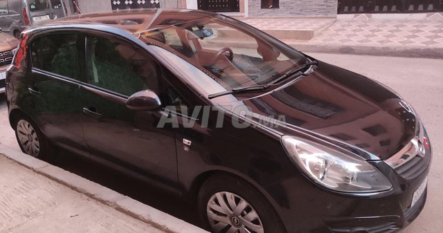 Voiture Opel Corsa 2011 à Marrakech Essence - 6 chevaux