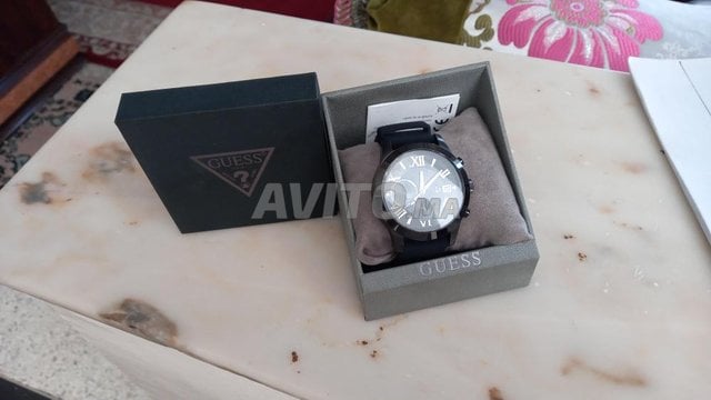 Prix montre discount guess homme maroc