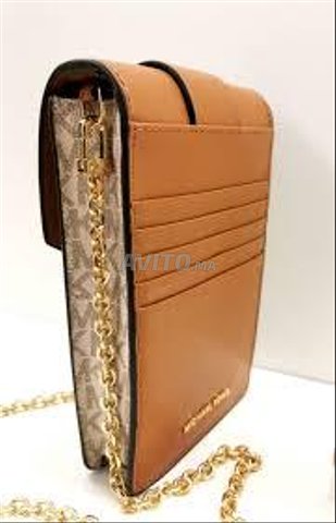 michael corse pochette de telephone en cuire Sacs et Accessoires