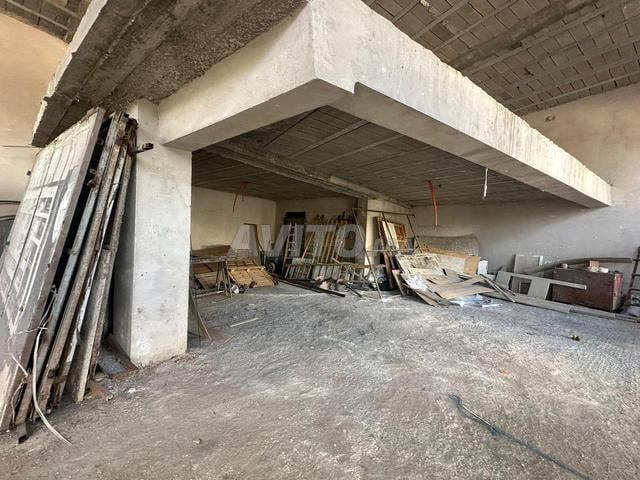 Magasin cinq rideaux faisant angle Bd Ghandi