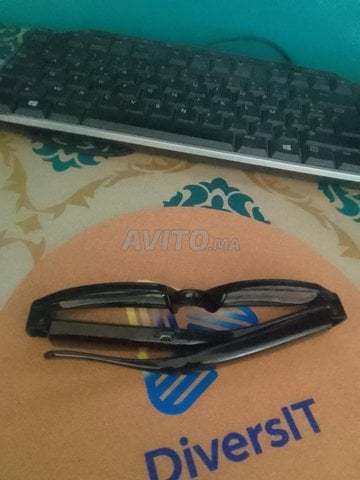 Lunettes camera caché