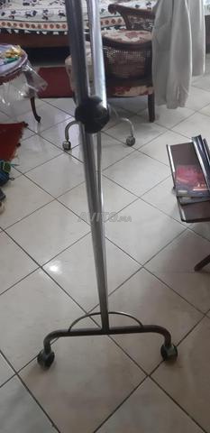 Porte ceintres en inox à 2 etages .