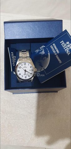 Montre best sale festina origine