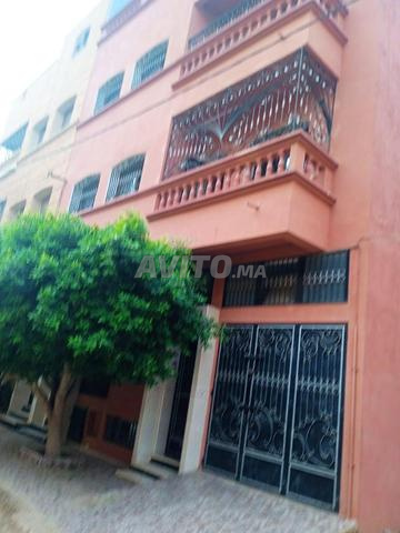 IMMEUBLE DE RDC 3ETAGES ET CAVE 