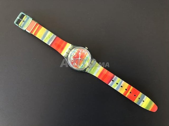 Montre femme SWATCH arc en ciel tanche Montres et Bijoux