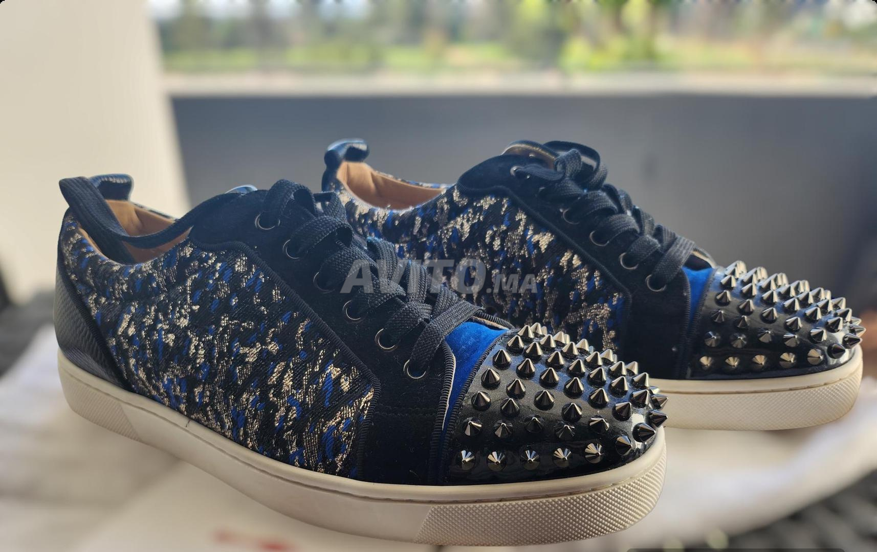 Louboutin homme discount prix boutique