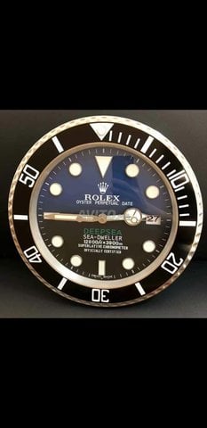 Pendule rolex prix hot sale