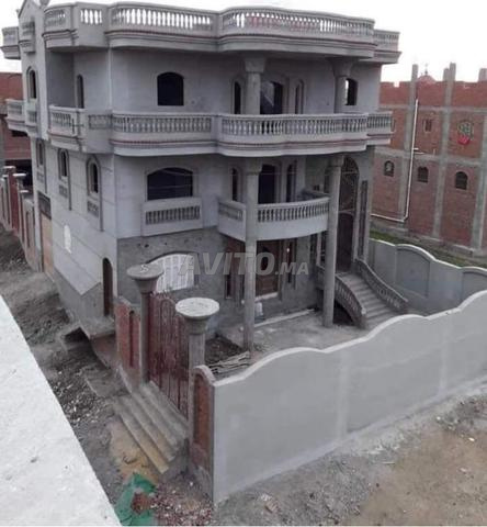 travaux de construction de maisons ou de villas