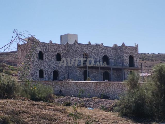 Travaux de construction de maisons ou de villas