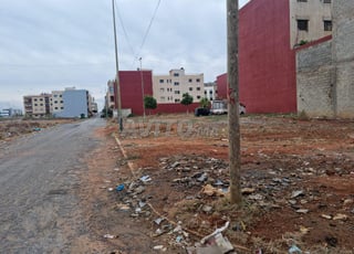 lot d'angle Titré RDC et 3 étages 