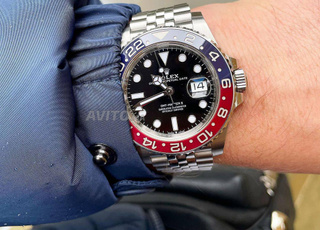 Rolex pepsi et batman avec sa boite