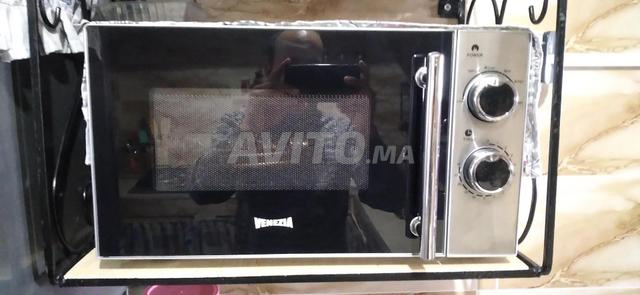 ميكرو أوند نقي ومازال جديد بالضمانة 