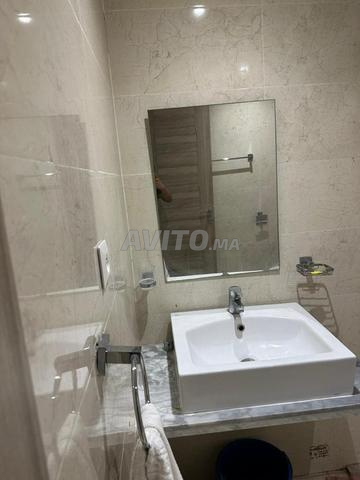 En location appart avec piscine - image 5