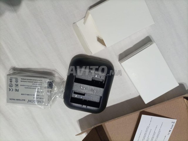 Batterie & chargeur compatible Canon (vendu)