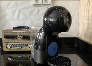 Machine à café capsules