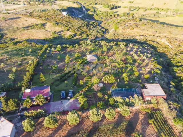 أرض 6500 متر مربع مع منزل للبيع ملوسة طنجة