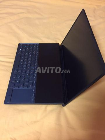 جهاز كمبيوتر محمول Asus Zenbook Duo (شاشتان) 14 بوصة - 2