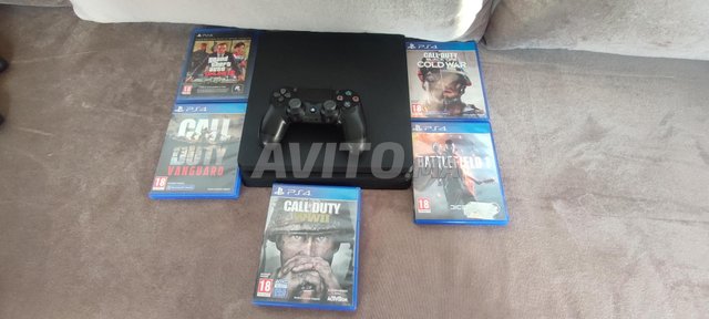 PS4 slim 1TB avec manette d'origine et 5 jeux 