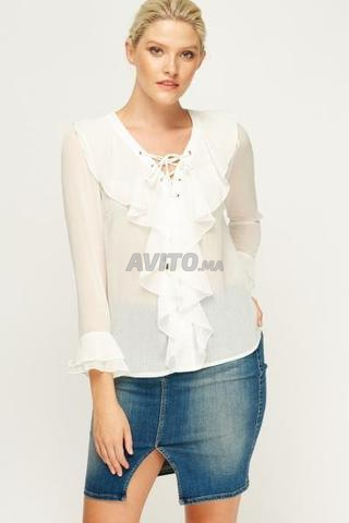 chemisier à volants à col noué