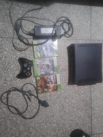 Xbox 360 fat avec 3 cd et manette