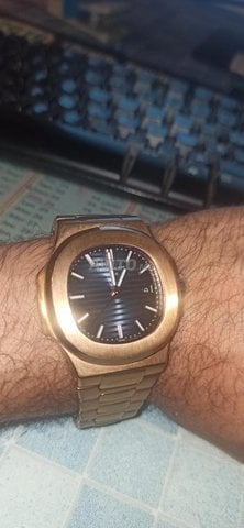 montre swiss patek philippe nautilus dore 