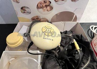 Tire lait et chauffe biberon