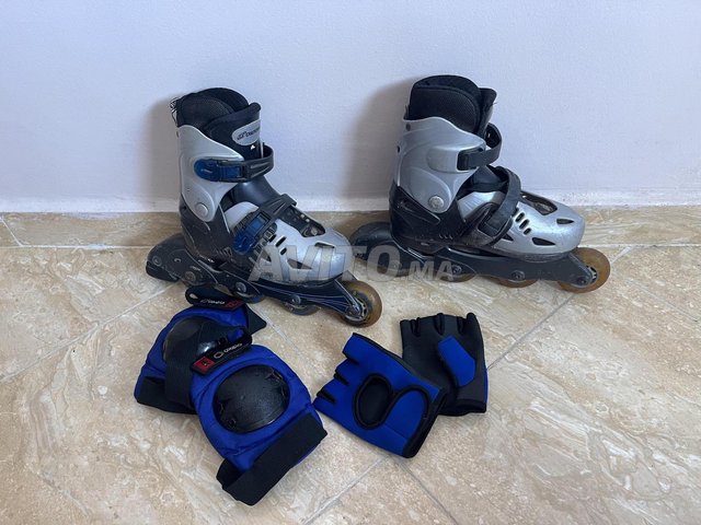 Rollers gris/noir 36 avec protection.