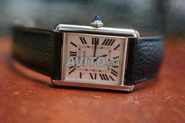 Cartier Tank Must Large 2023 état neuf Full Set.