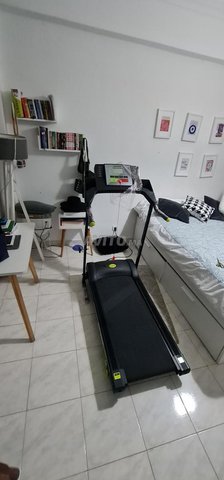 Era tapis roulant 