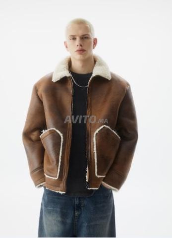 Double-faced faux shearling jacket PULL AND BEAR