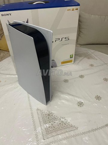 PS5 plus JEUX plus mannette noire 