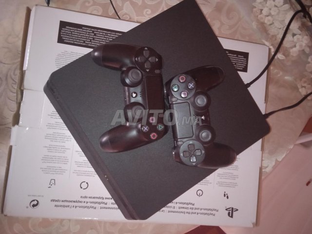 Ps4 slim n9i m3a jouj mannetat original 
