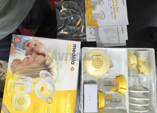 tire lait electrique medela double pompage