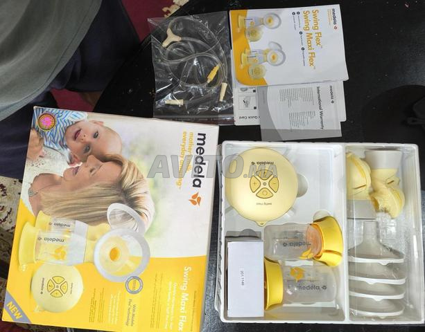 tire lait electrique medela double pompage