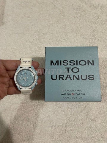 montre swatch omega original
