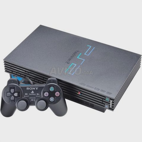 Playstation 2 console avec 2 Controller et jeux CD