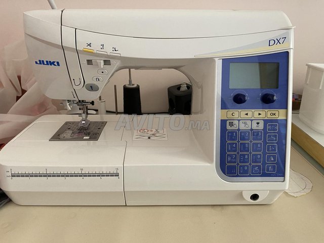 À vendre JUKI DX7 machine à coudre