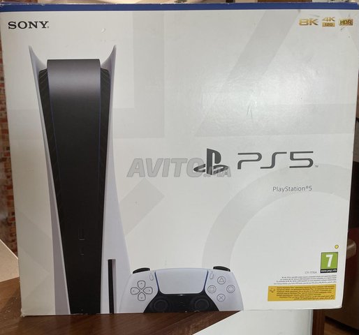 Ps5 Standard et 2 manette et 4 jeux