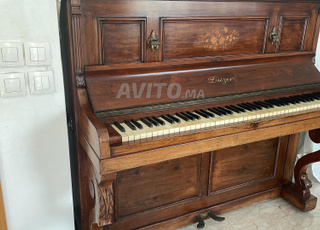 À vendre très beau piano en bois 