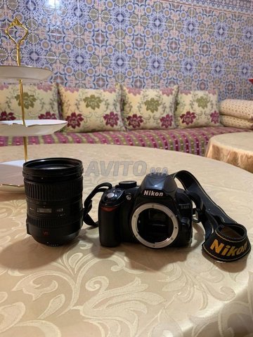 camera nikon d3100 avec objectife 18-200