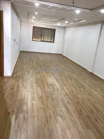 باركيه HDF8MM مع طبقة عازلة من الفوم وتركيب احترافي